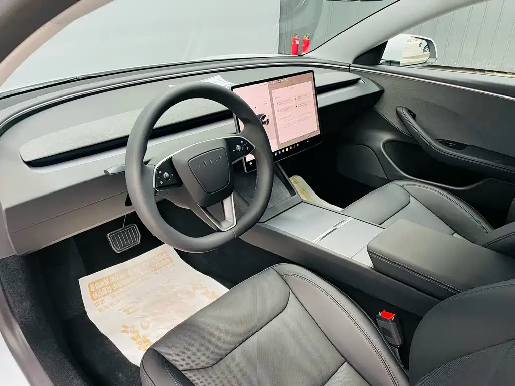 Tesla Model 3 — фото 20
