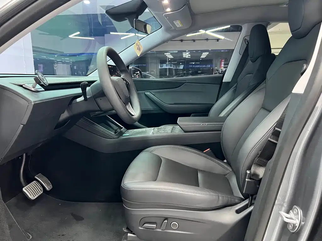 Tesla Model Y — фото 14