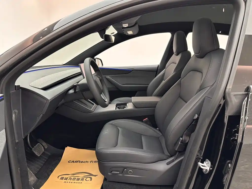 Tesla Model Y — фото 8