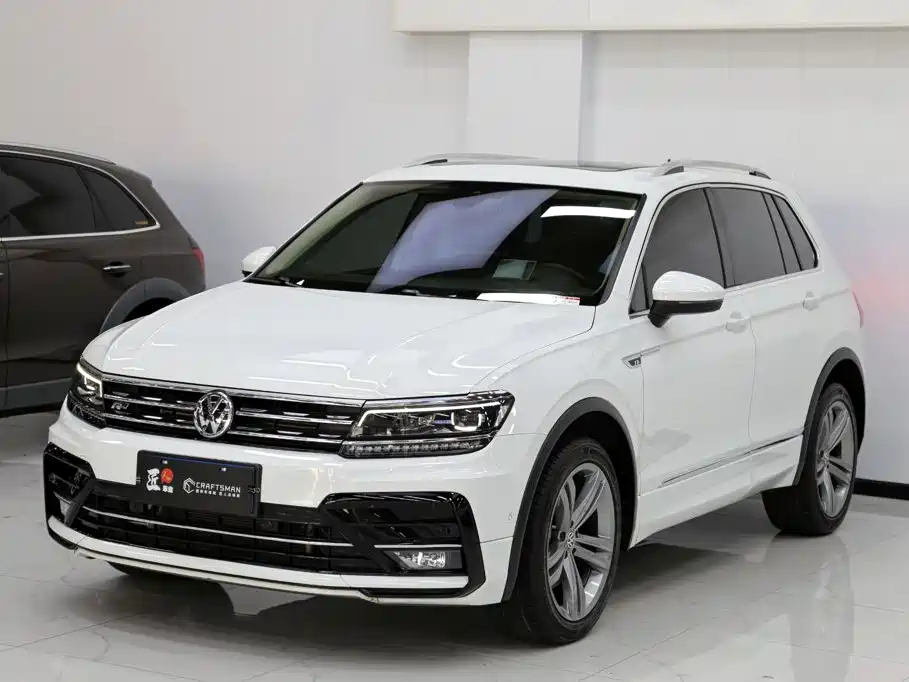 Volkswagen Tiguan — фото 19