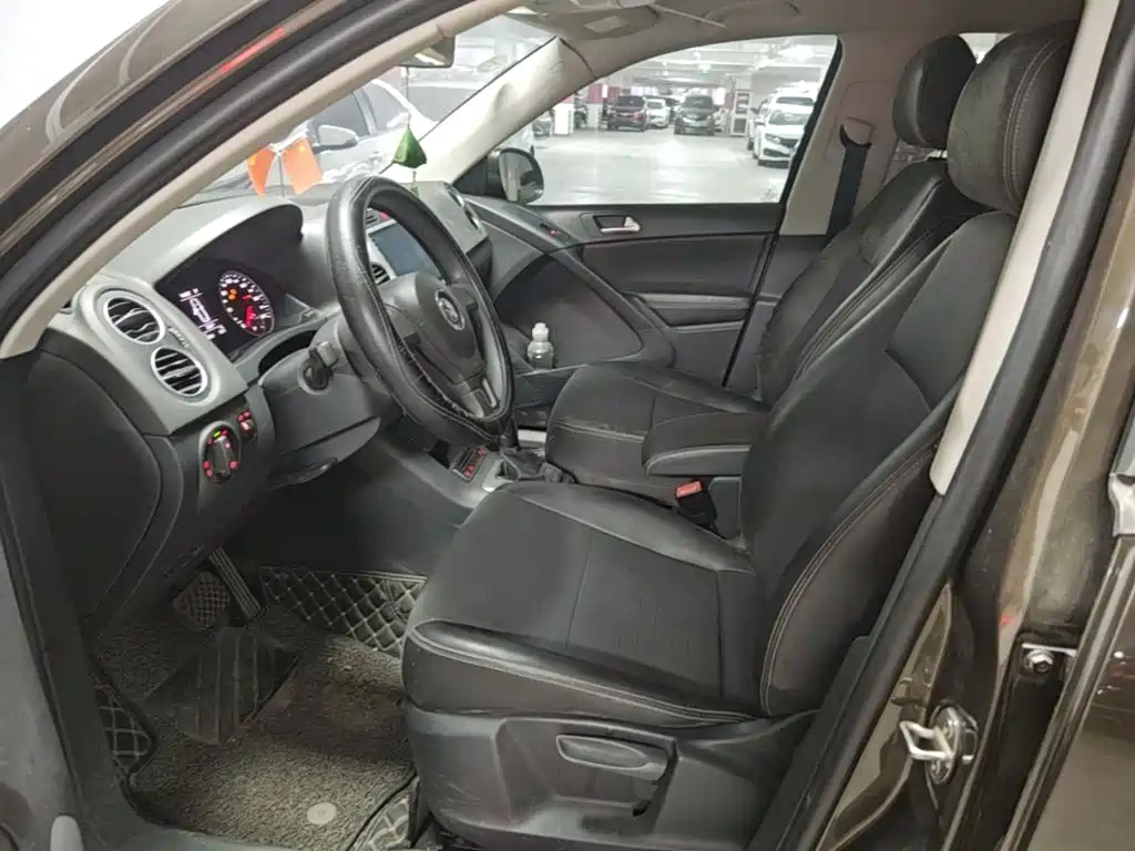 Volkswagen Tiguan — фото 18