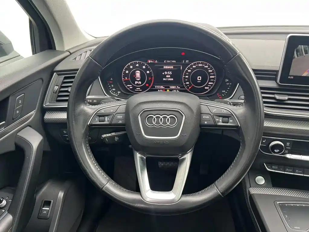 Audi Q5L — фото 6