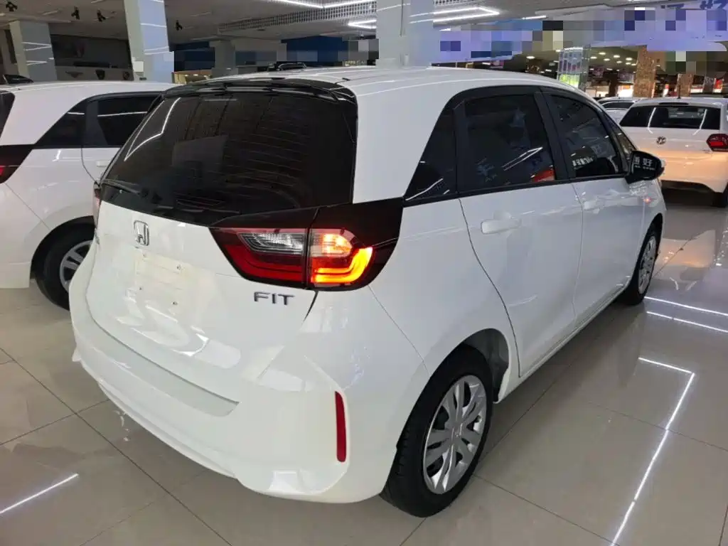 Honda Fit — фото 7