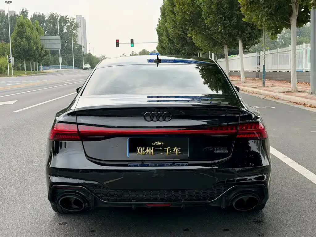 Audi A7L — фото 8
