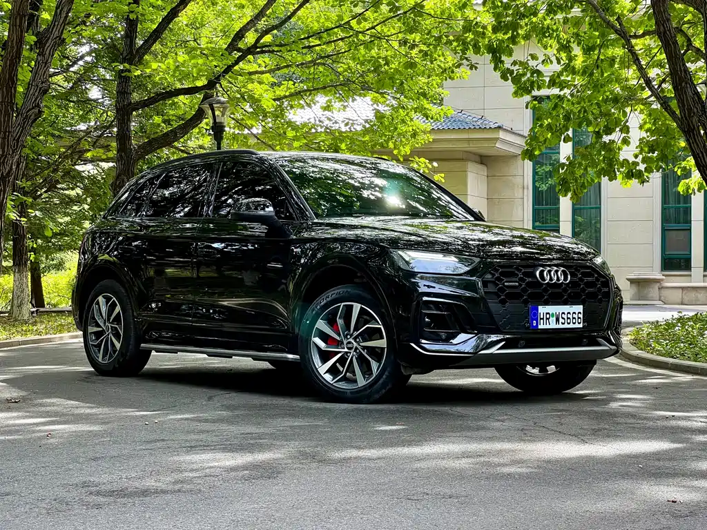 Audi Q5L — фото 5