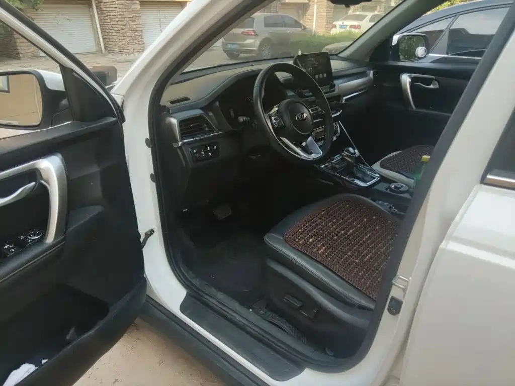 Kia Sportage — фото 14