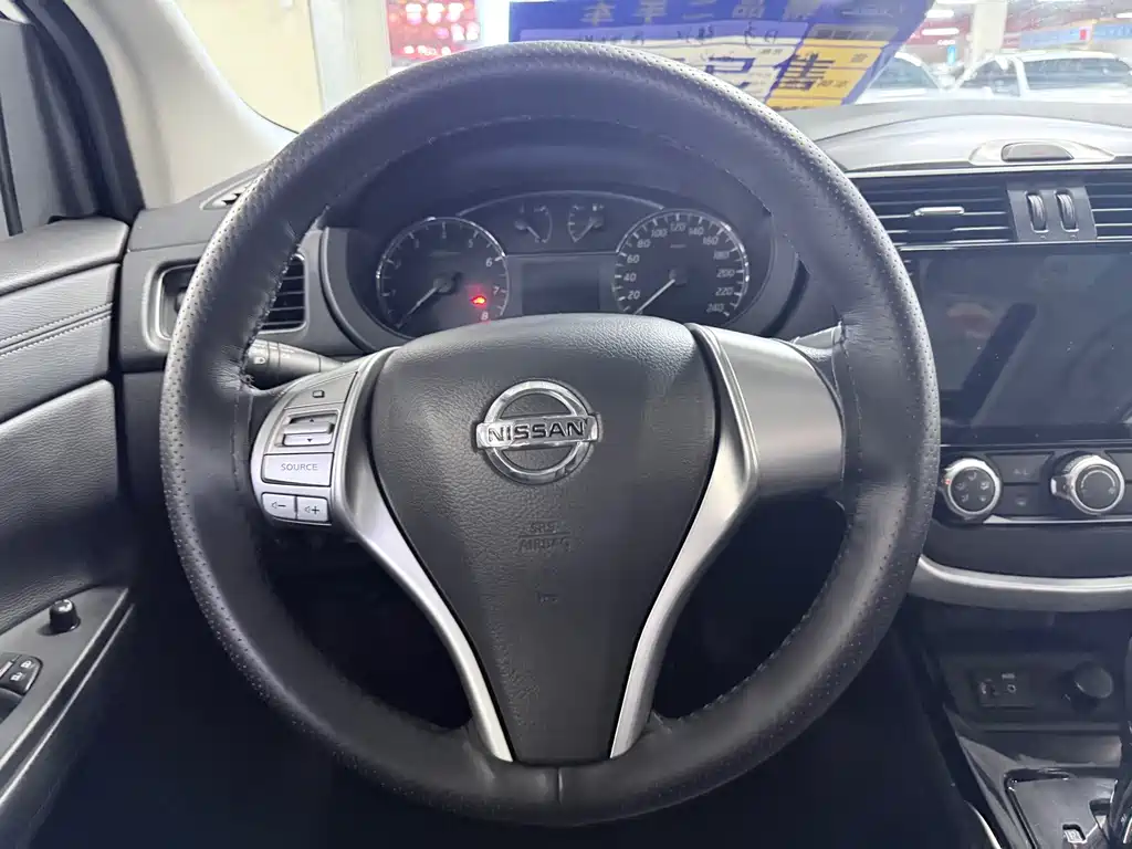 Nissan Tiida — фото 13