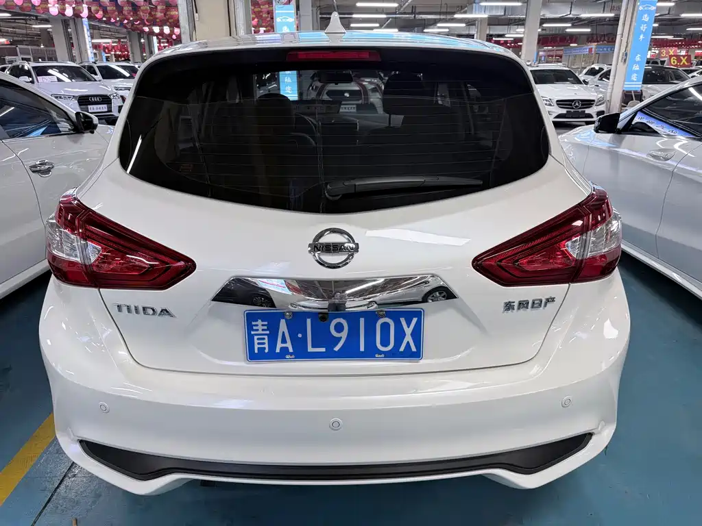 Nissan Tiida — фото 17