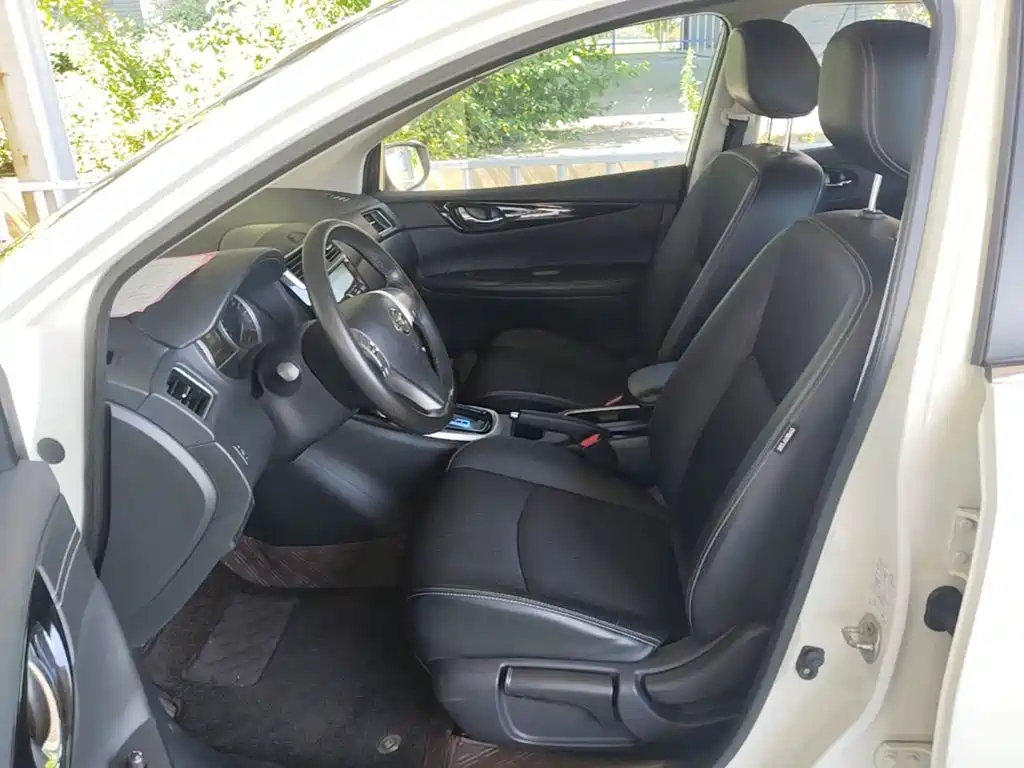 Nissan Tiida — фото 15