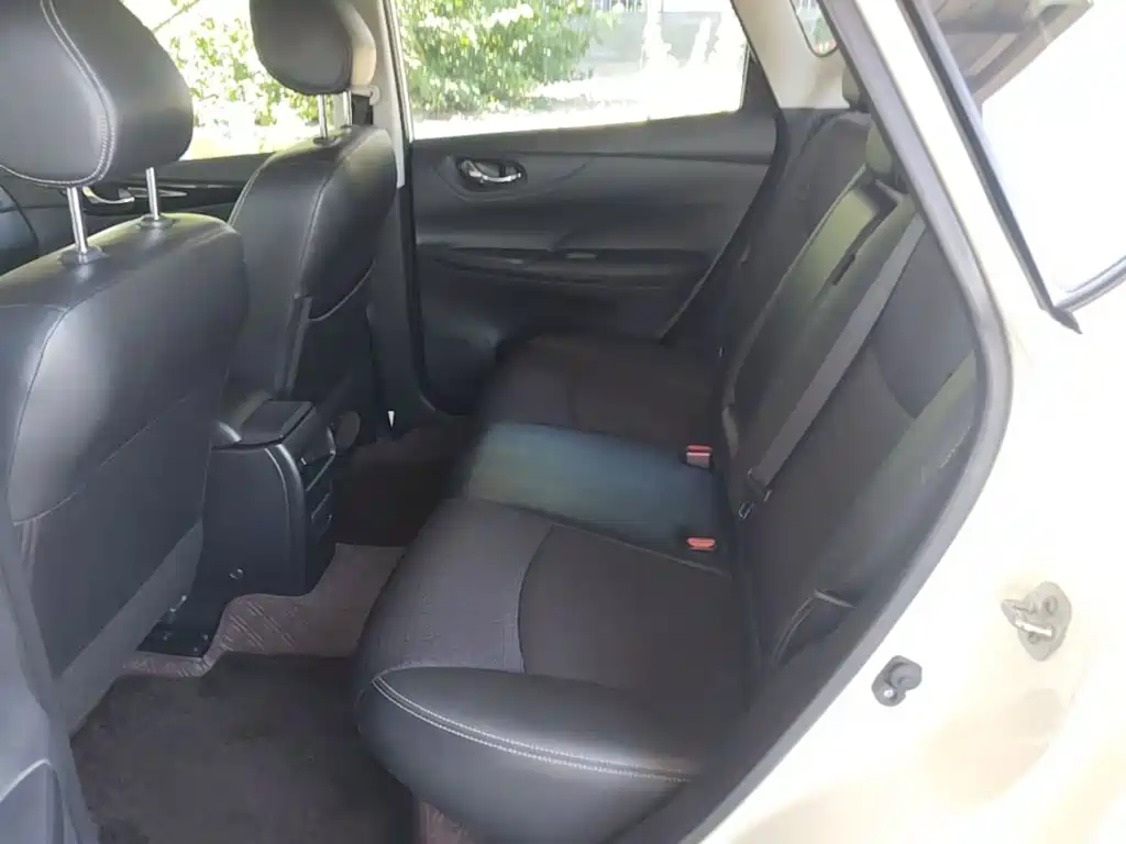 Nissan Tiida — фото 17