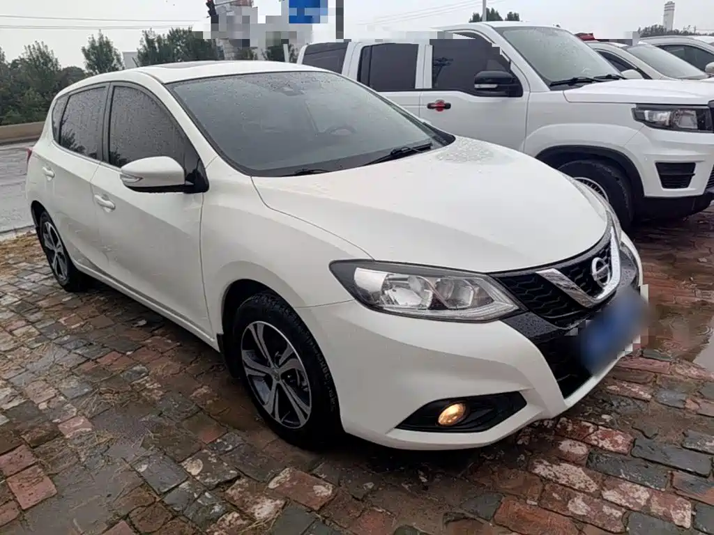Nissan Tiida — фото 4