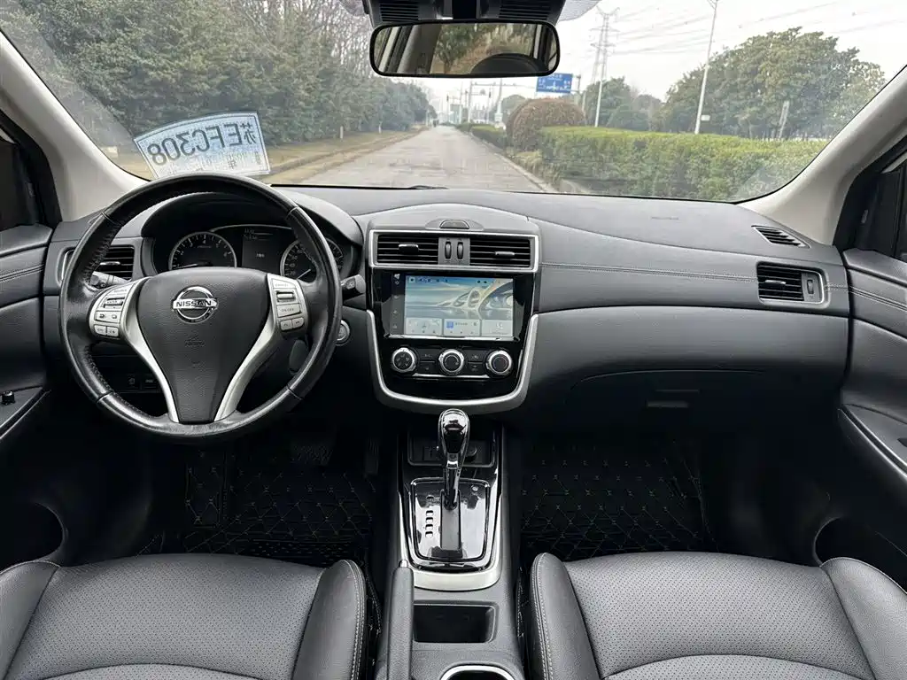 Nissan Tiida — фото 8