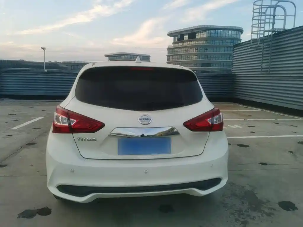 Nissan Tiida — фото 9