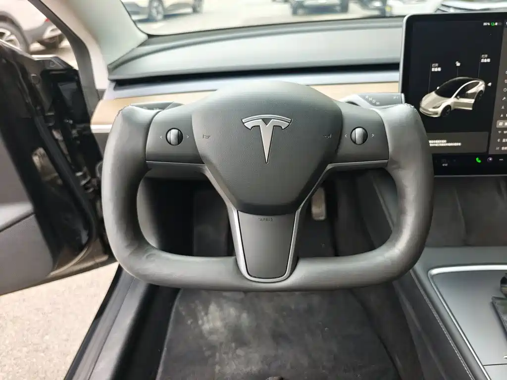 Tesla Model 3 — фото 11