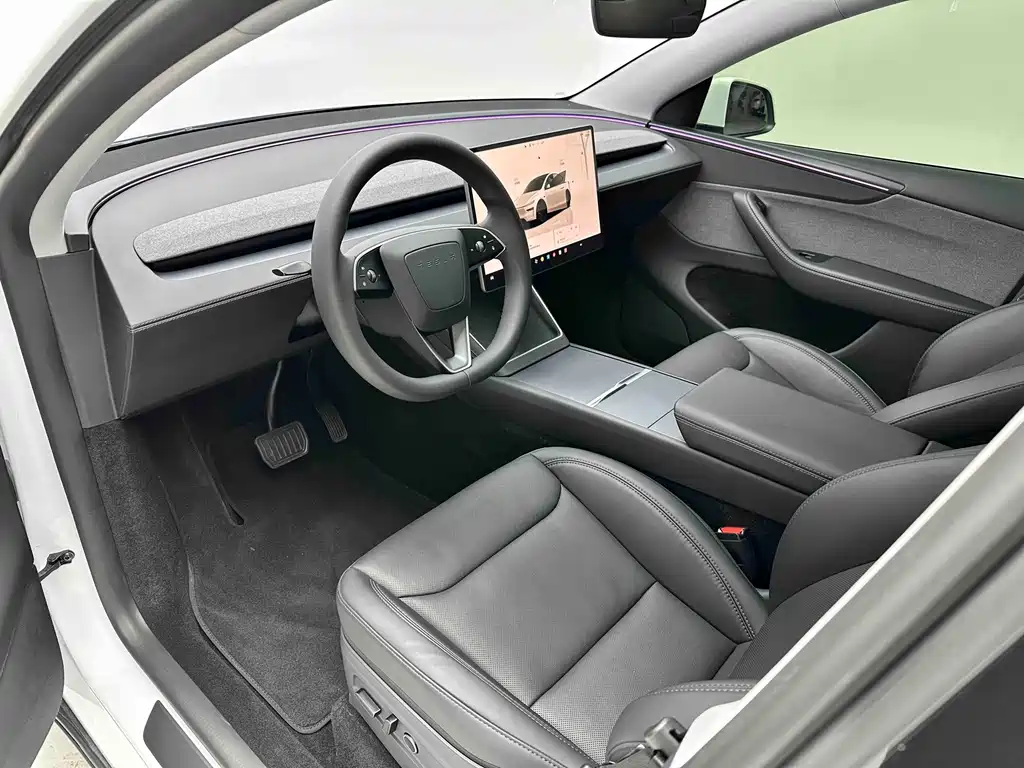 Tesla Model Y — фото 10