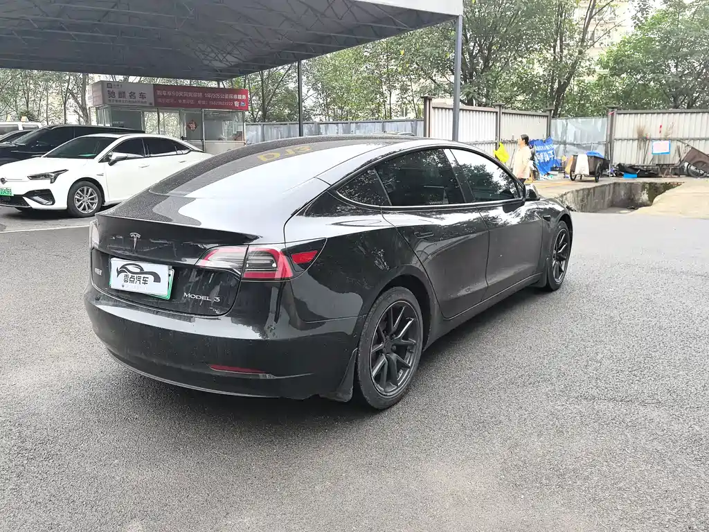 Tesla Model 3 — фото 7