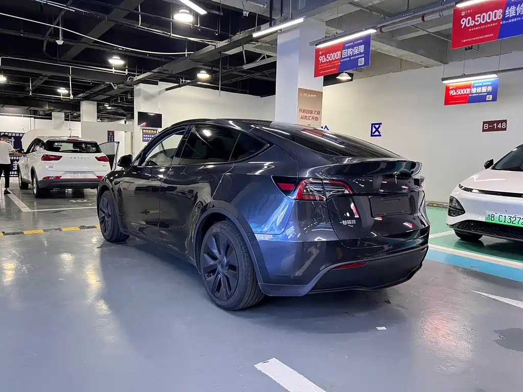 Tesla Model Y — фото 18