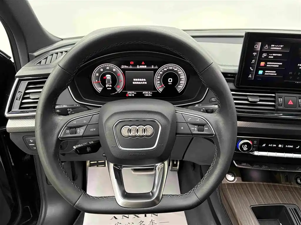 Audi Q5L — фото 8