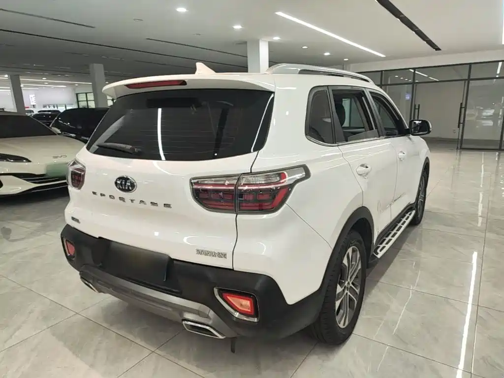 Kia Sportage — фото 7