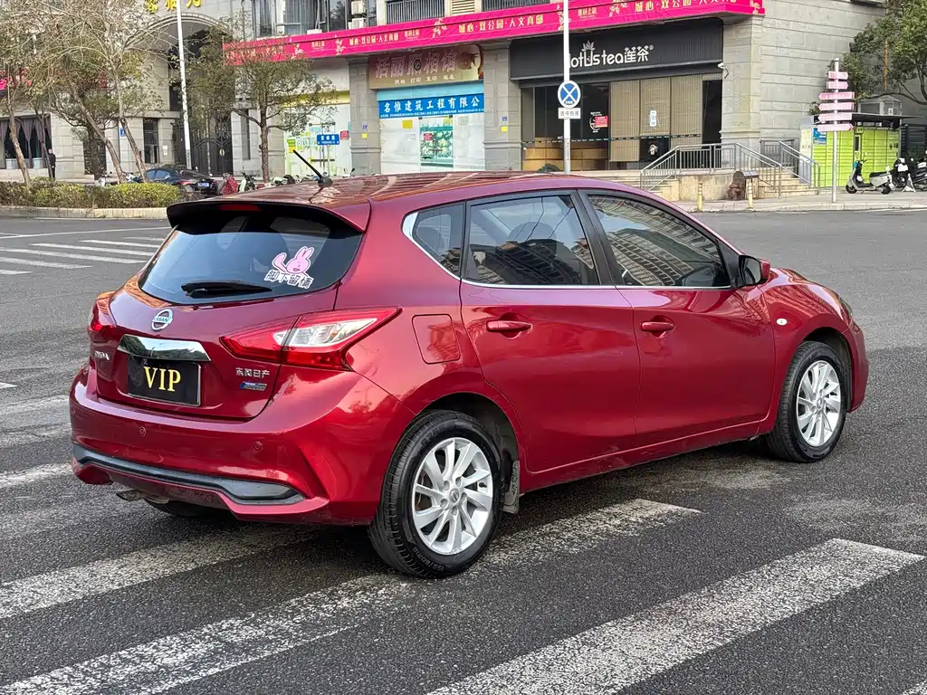 Nissan Tiida — фото 7