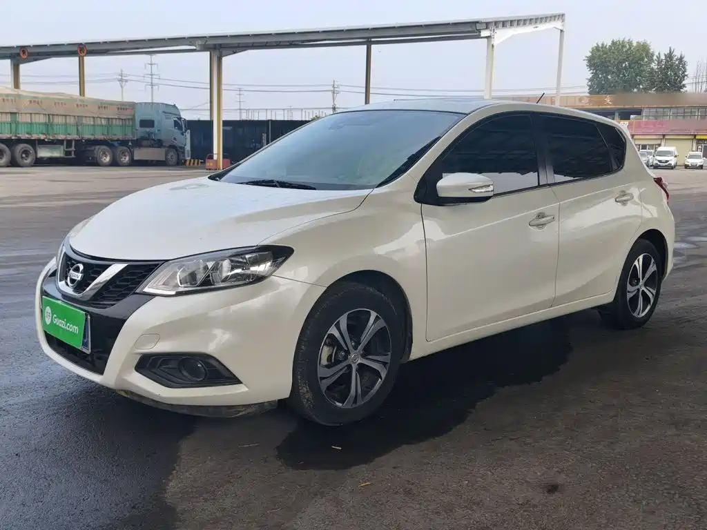 Nissan Tiida — фото 2
