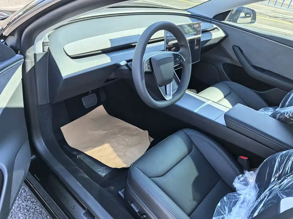 Tesla Model 3 — фото 5