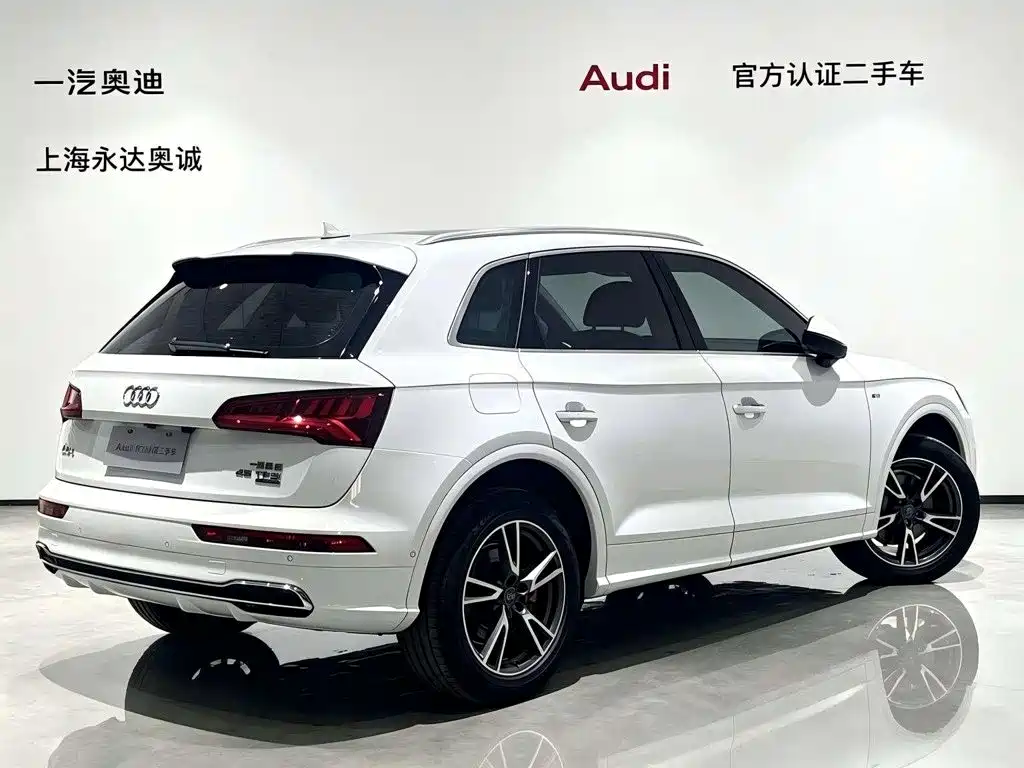 Audi Q5L — фото 5