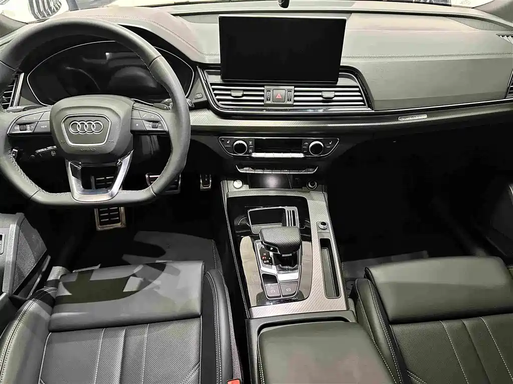 Audi Q5L — фото 14