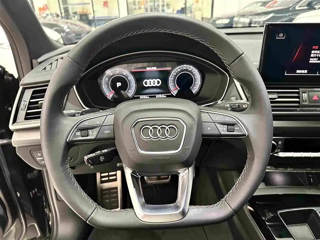 Audi Q5L — фото 7