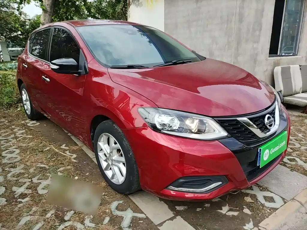Nissan Tiida — фото 4