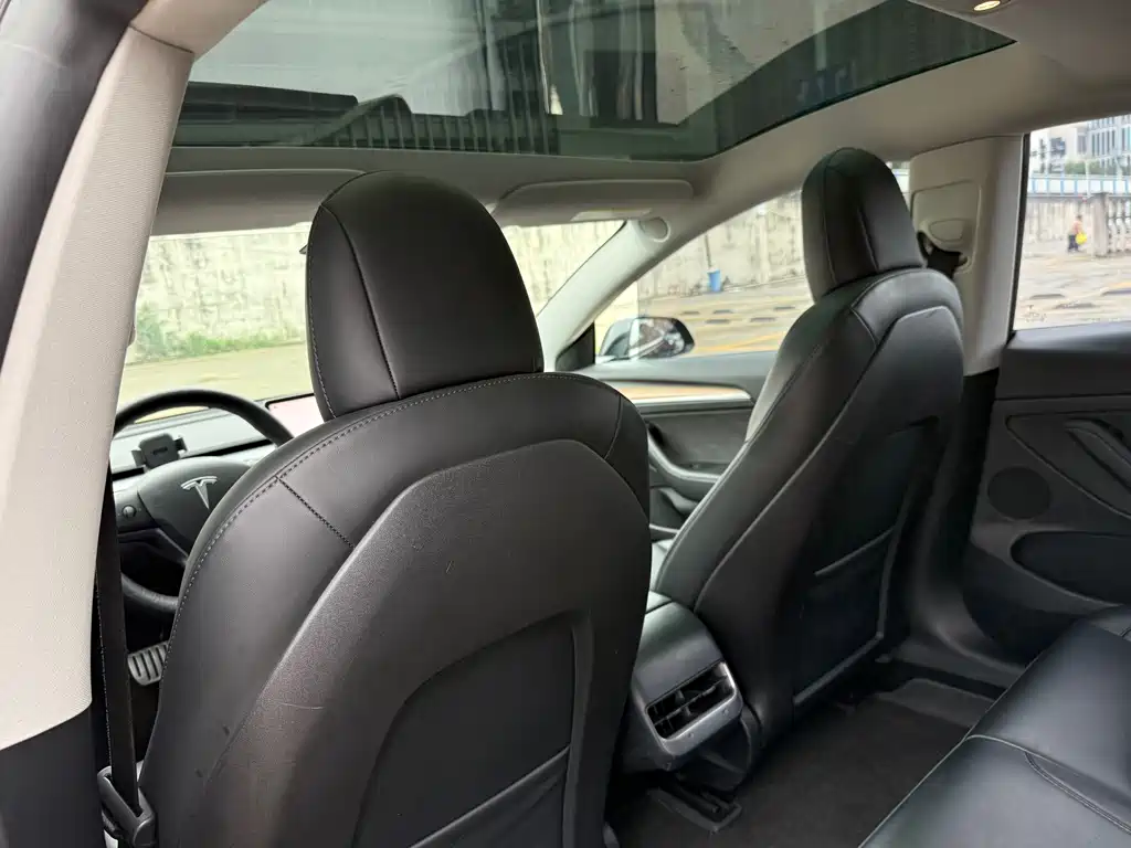 Tesla Model 3 — фото 14