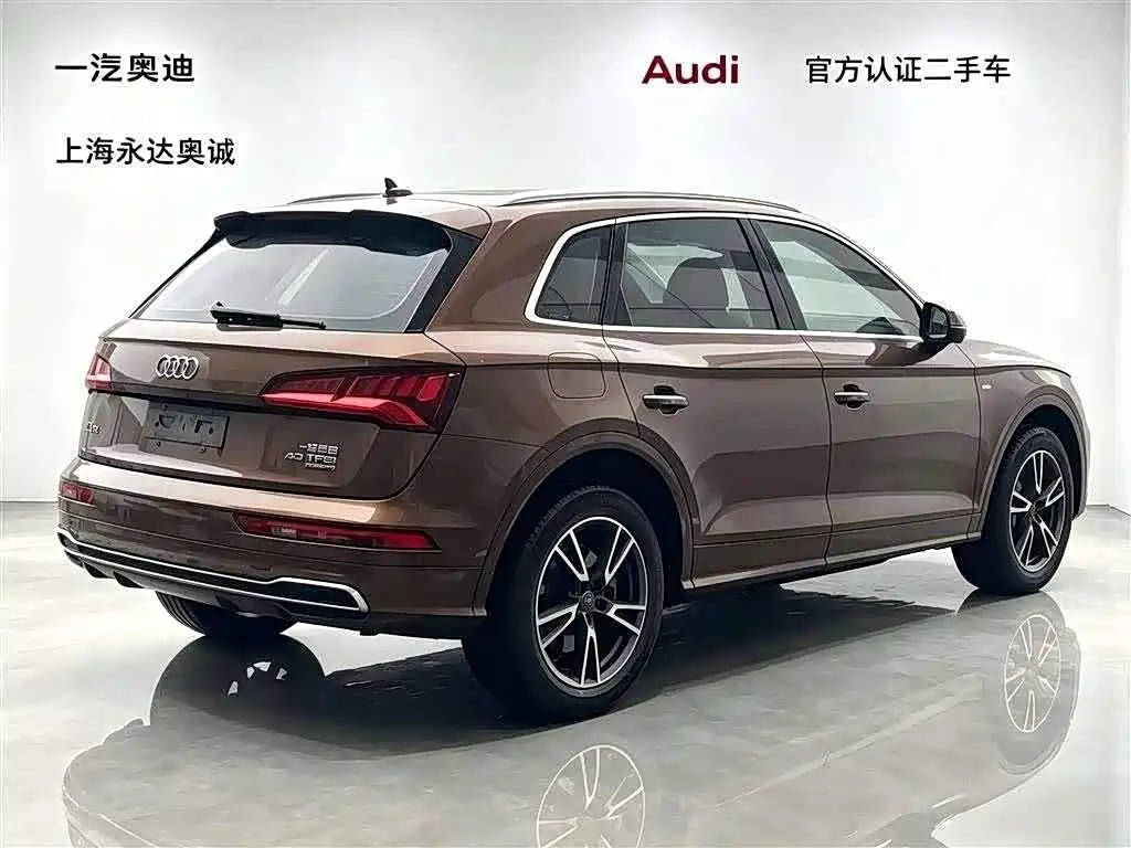 Audi Q5L — фото 5
