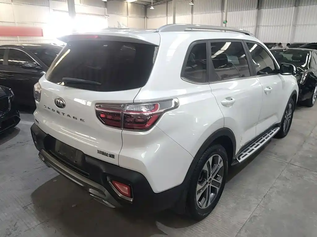 Kia Sportage — фото 7