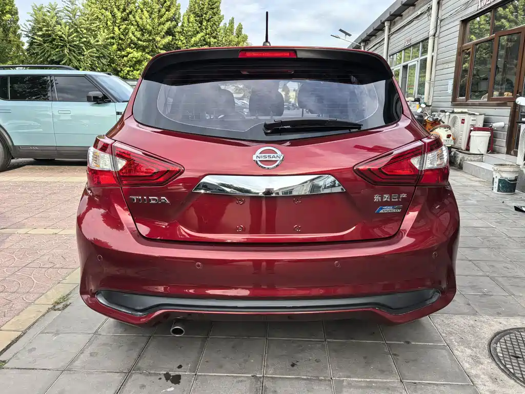 Nissan Tiida — фото 4
