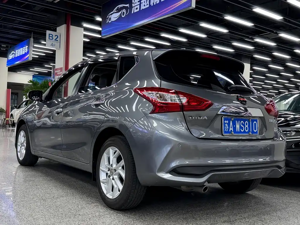 Nissan Tiida — фото 11