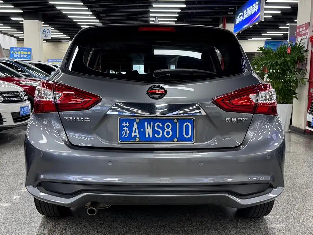 Nissan Tiida — фото 22