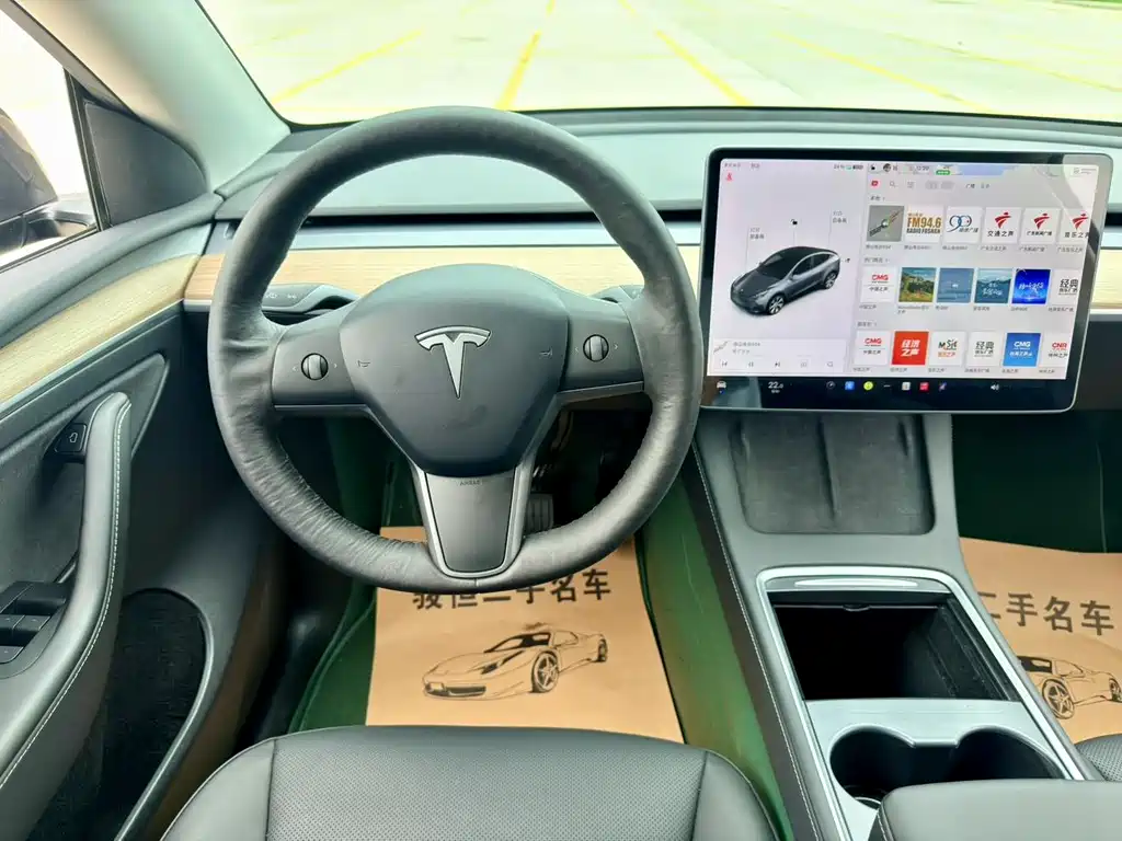 Tesla Model Y — фото 10