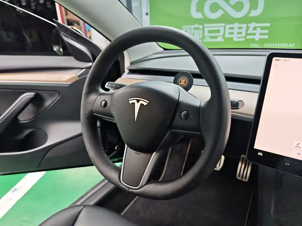 Tesla Model 3 — фото 14
