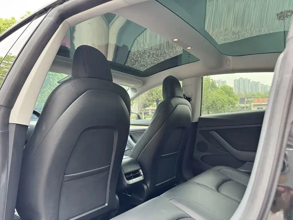 Tesla Model 3 — фото 19