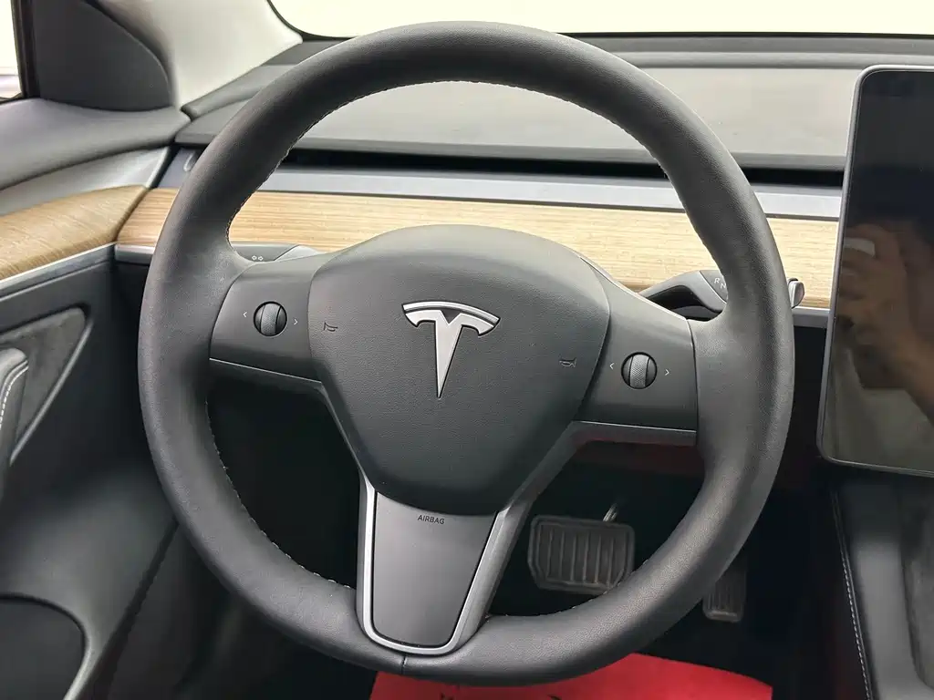 Tesla Model 3 — фото 23