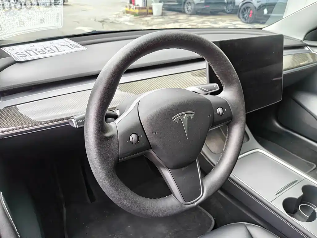 Tesla Model 3 — фото 11