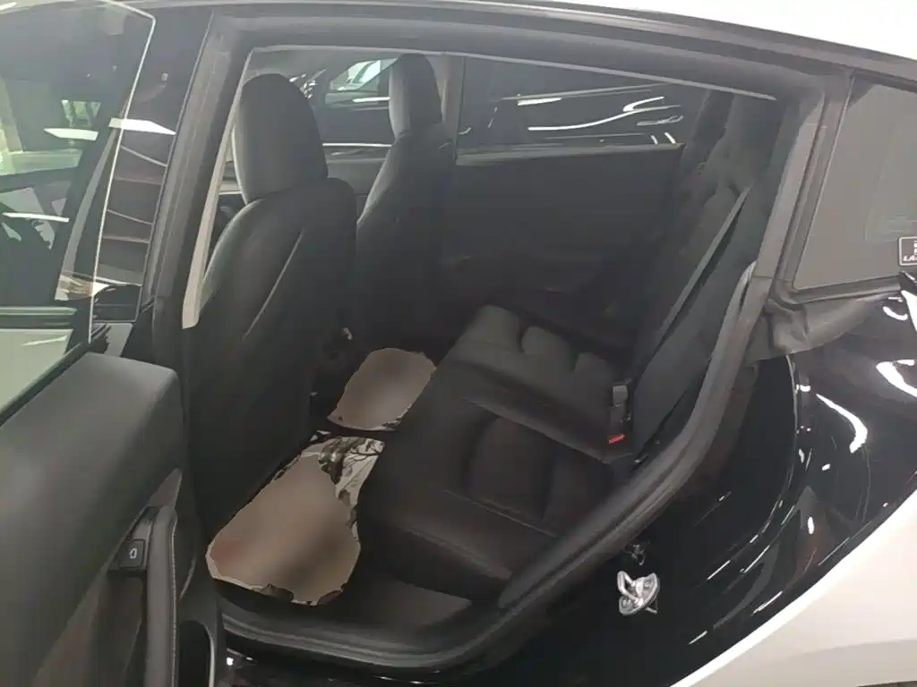 Tesla Model 3 — фото 17