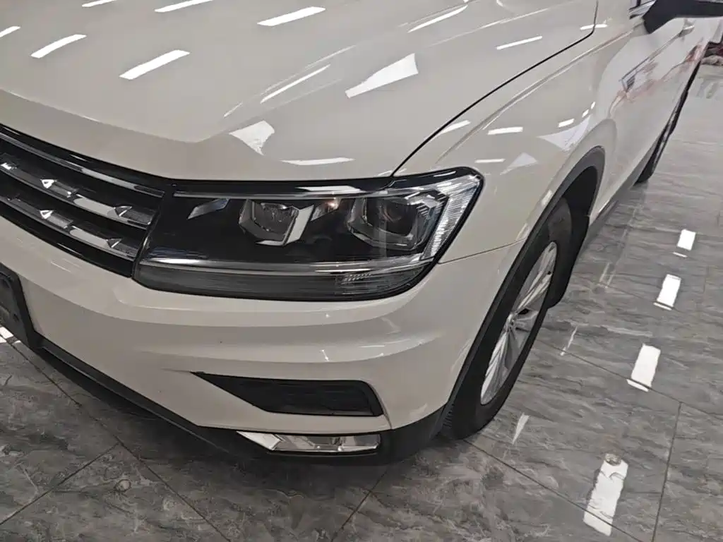 Volkswagen Tiguan L — фото 24
