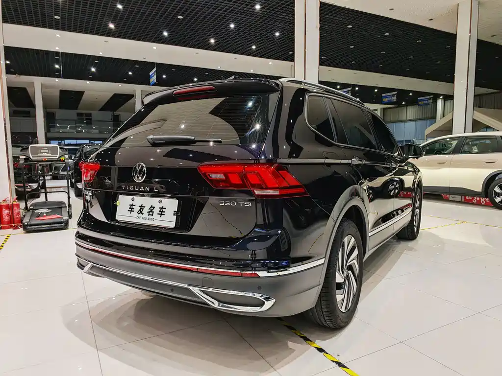 Volkswagen Tiguan L — фото 16