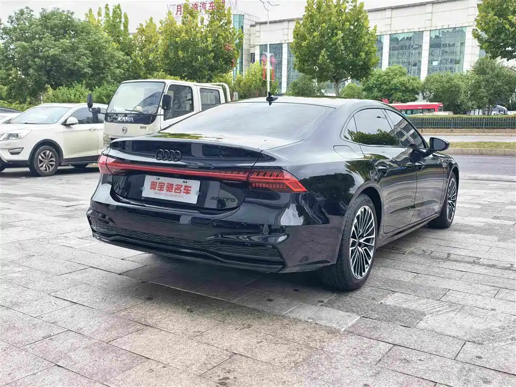 Audi A7L — фото 7