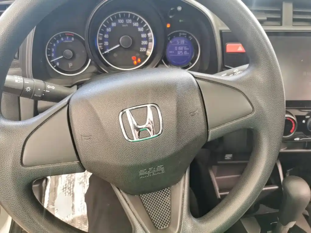 Honda Fit — фото 11