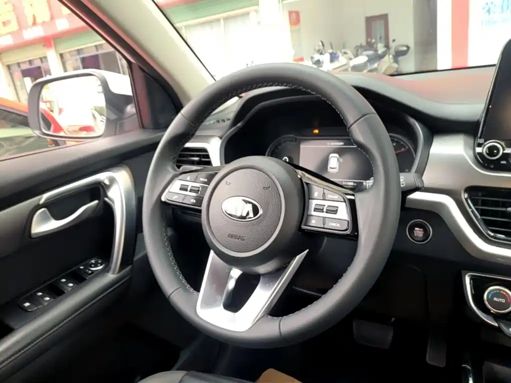 Kia Sportage — фото 11