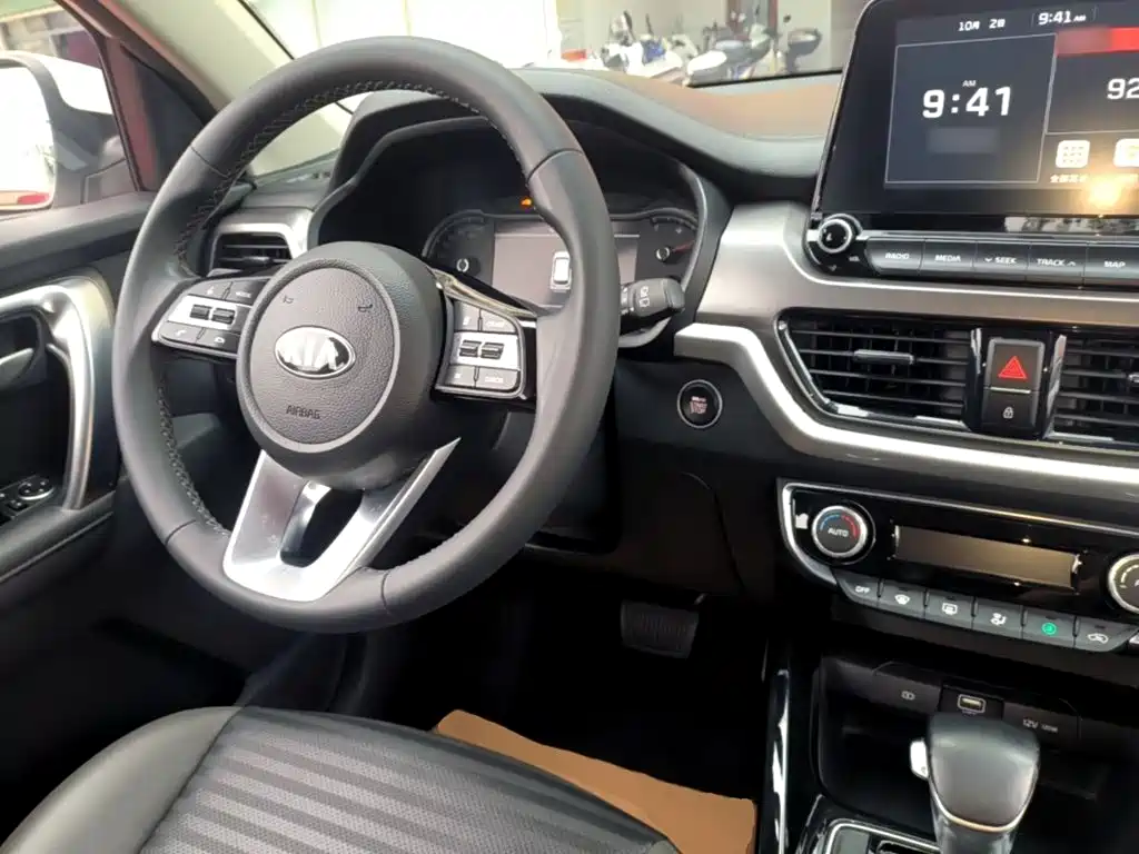 Kia Sportage — фото 10