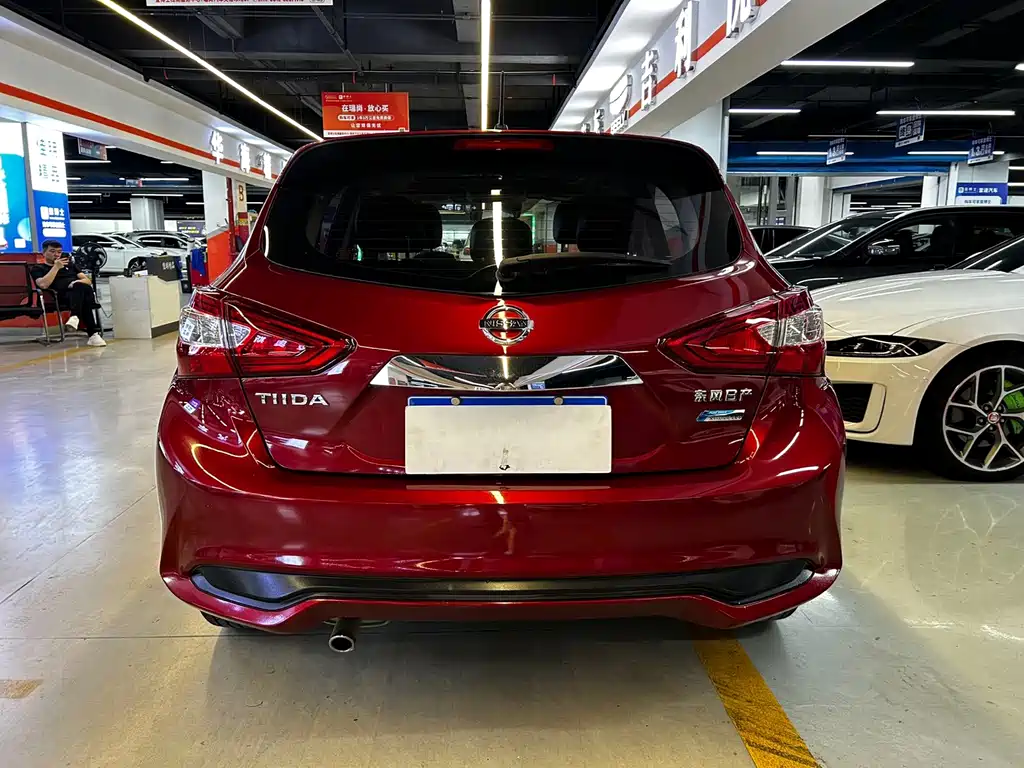 Nissan Tiida — фото 13