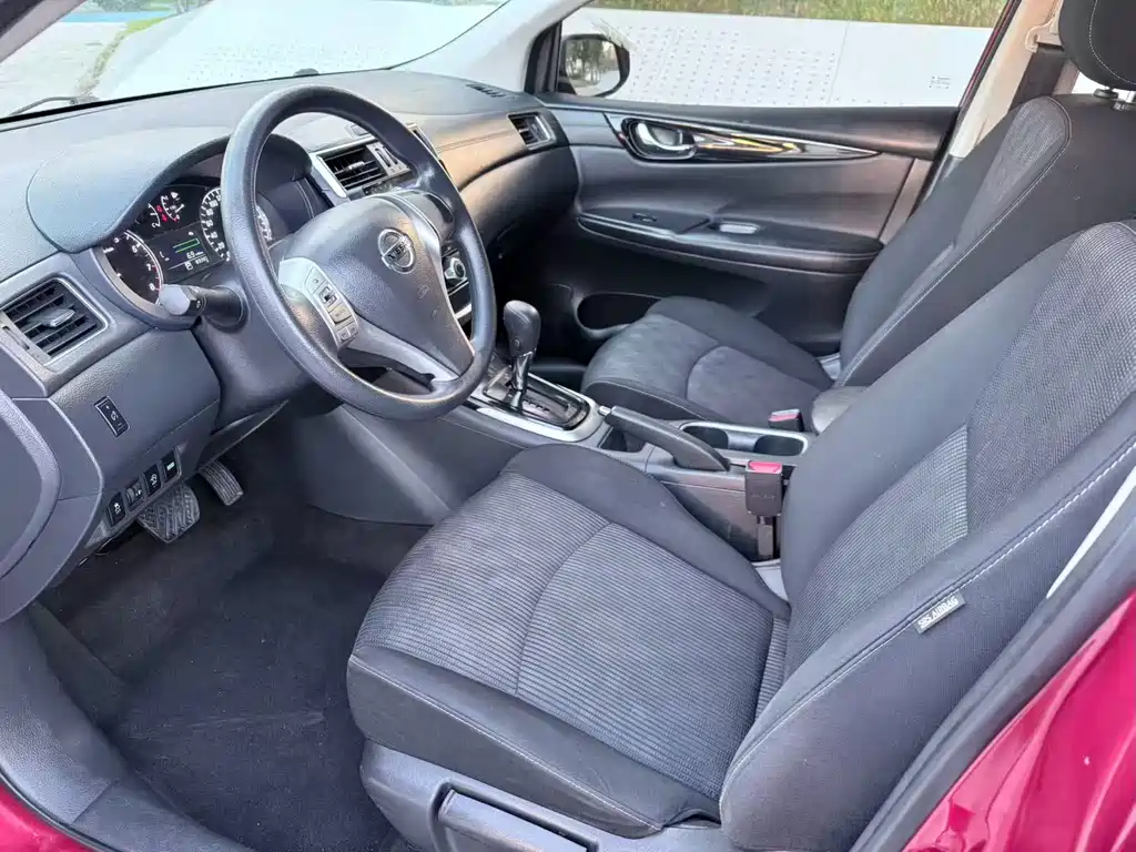 Nissan Tiida — фото 4